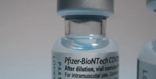 COVID-19 vaccine vile with Pfizer-BioNTech label for emergency rooms in Houston, TX
