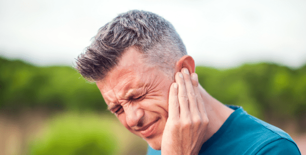 person with ear pain 