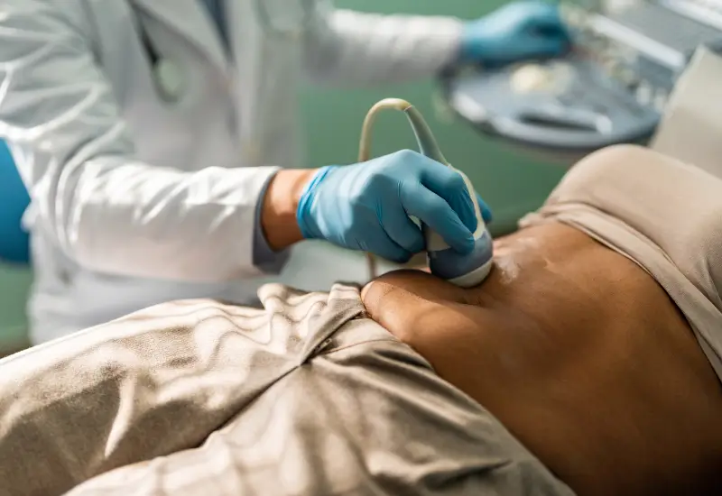 Healthcare provider performing an abdominal ultrasound in Jersey Village